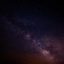 内容编辑深夜党的头像，深色背景配星空元素